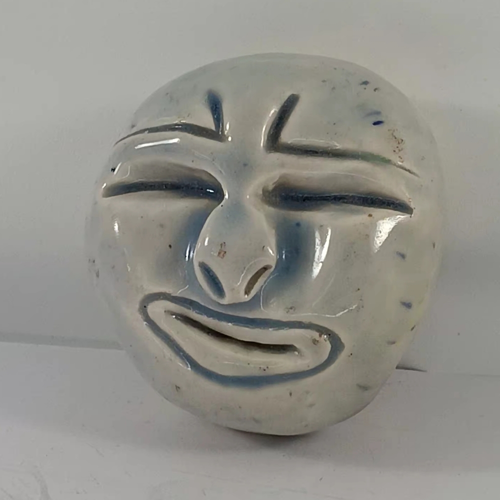 Fired Clay Face Paper Weight